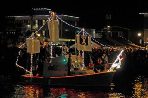 A vessel dressed and ready for the Lighted Boat Parade in Mystic CT, one of our favorite mystic winter events 