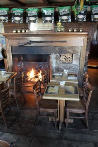 Fireplace in the pub basement of the Captain Daniel Packer Inn