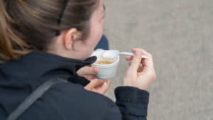 Close up of a young girl eating chowder