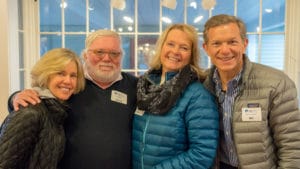 Board Members and Staff from Always Home celebrate at the Cabin Fever Festival