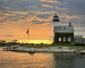 Lighthouse in Stonington,CT with a sunset backdrop
