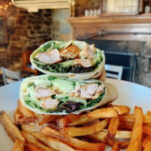 Delicious wrap and french fires in front of a historic fireplace at Daniel Packer Inne in Mystic.