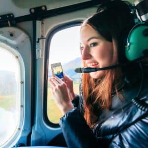 Girl Looking out window during Helicopter tour in Westerly, Rhode Island