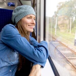 Woman riding a train